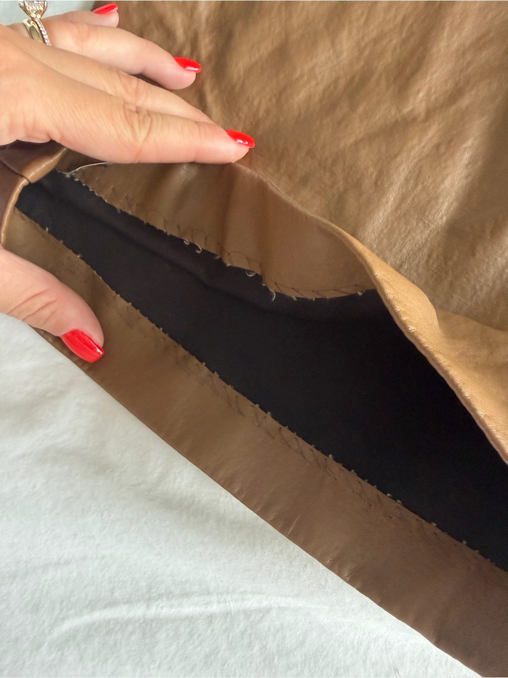 The Frankie Shop Pernille Pleated Faux Leather Shorts in Brown - Picture 7 of 16
